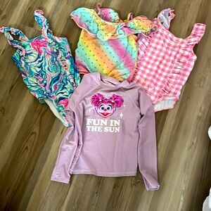 Bundle of swimsuits 🩱 and rash guard long sleeve shirt sizes 5-6 years old